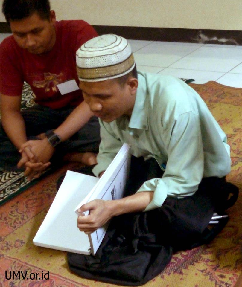 Pengajar membaca Al-Quran
